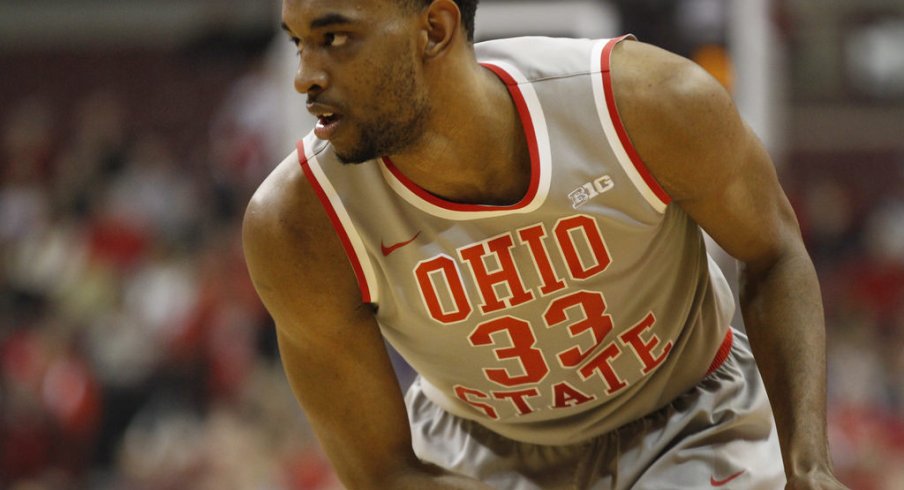 Keita Bates-Diop sizes up a Michigan defender.