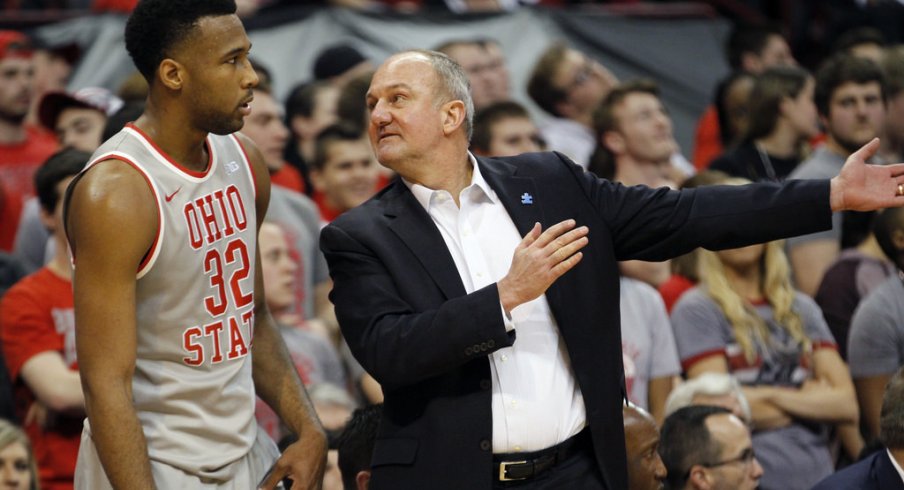 Thad Matta talks to Trevor Thompson during Tuesday's game against Michigan.