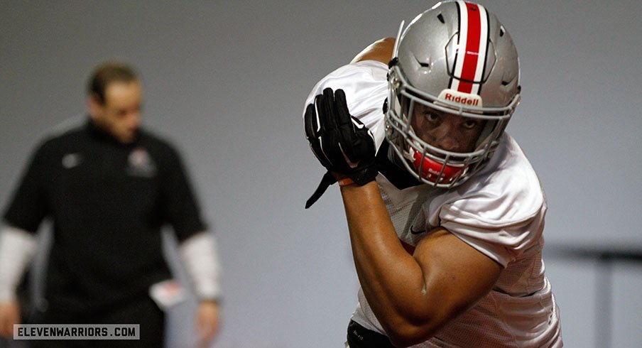 Dre'Mont Jones works out at Ohio State's first spring practice.