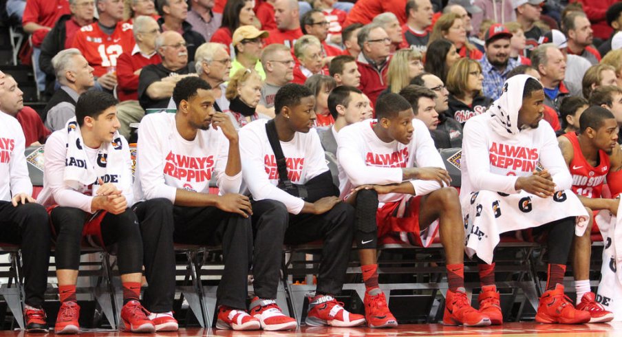 Ohio State basketball sits on the bench for a game against Florida in the NIT.