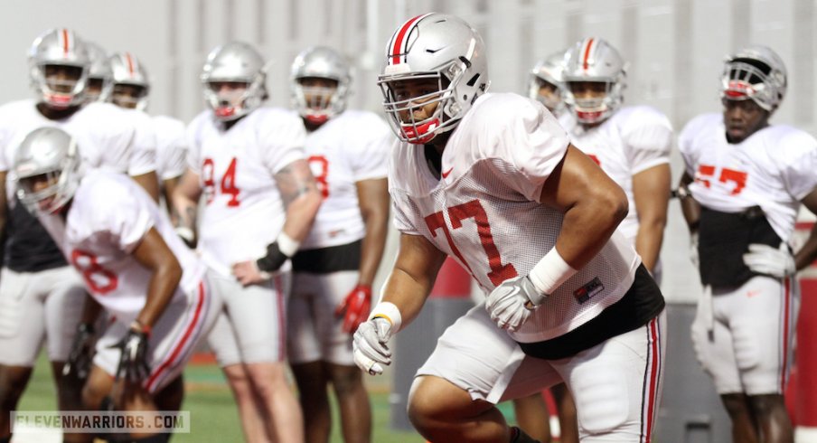 Michael Hill works out during Ohio State's spring practice Tuesday.