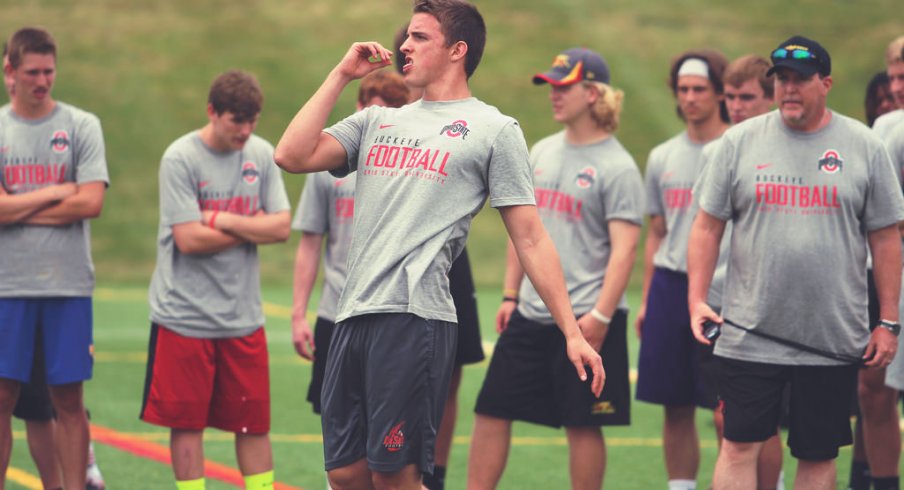 Drue Chrisman punts at an Ohio State football camp.