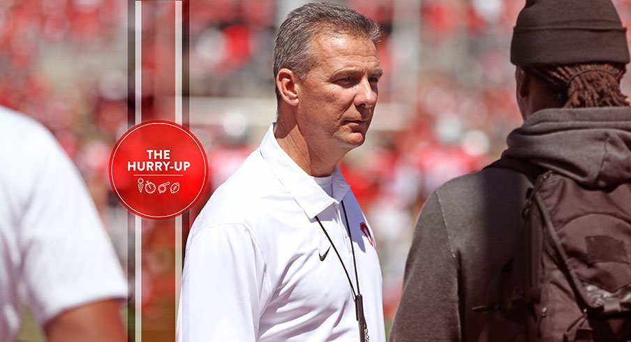 Urban Meyer talking to Najee Harris.