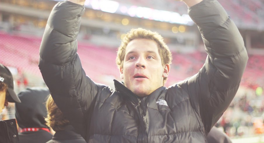 Nick Bosa plays to the crowd pregame at Ohio State in 2015.