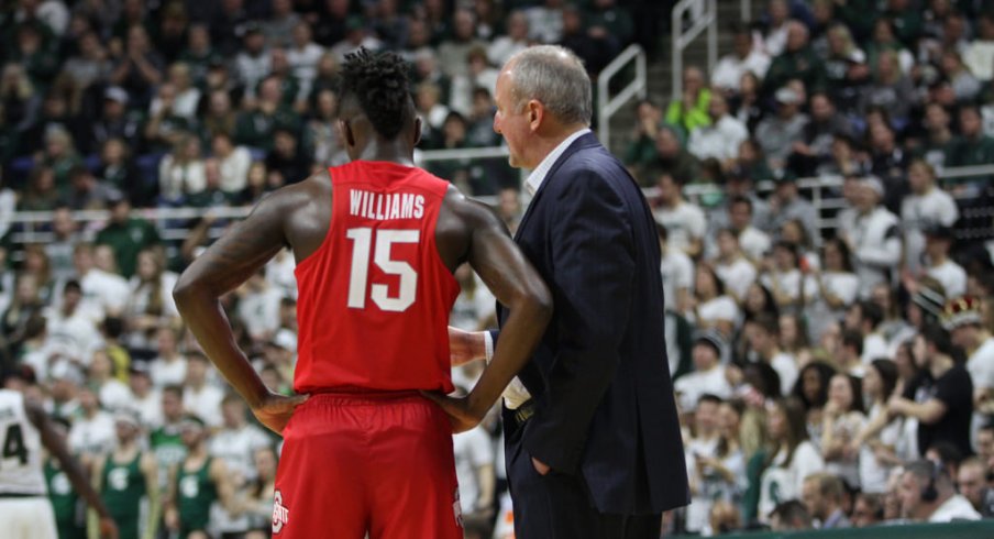 Thad Matta and Kam Williams. 