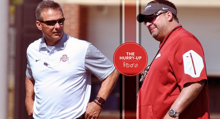 Urban Meyer and Bret Bielema at today's MCAOFGA Satellite Camp