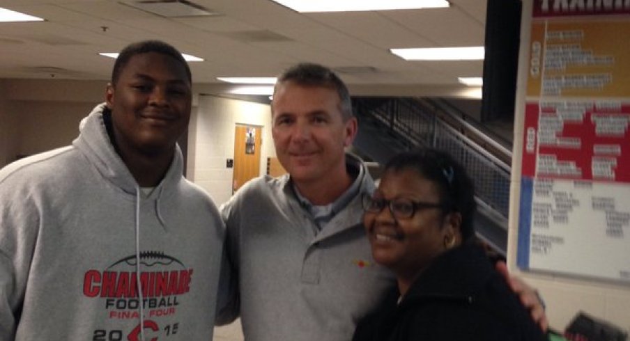 Urban Meyer with Trevor Trout and his mother.