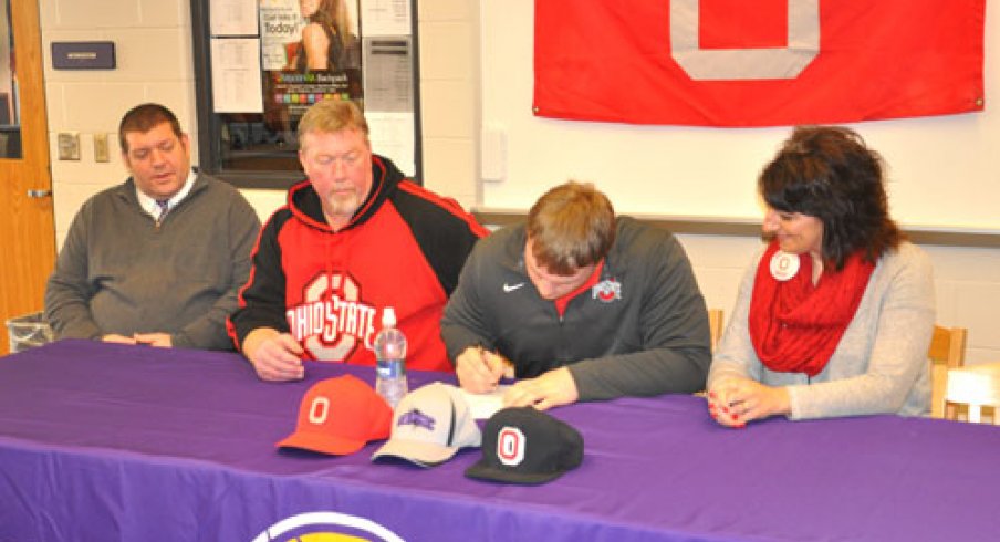 Gavin Cupp inks his letter to Ohio State. 