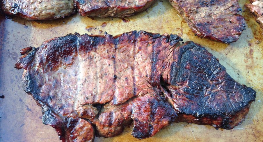 An Arkansas fan grilled a steak that looks like the Razorbacks' logo.