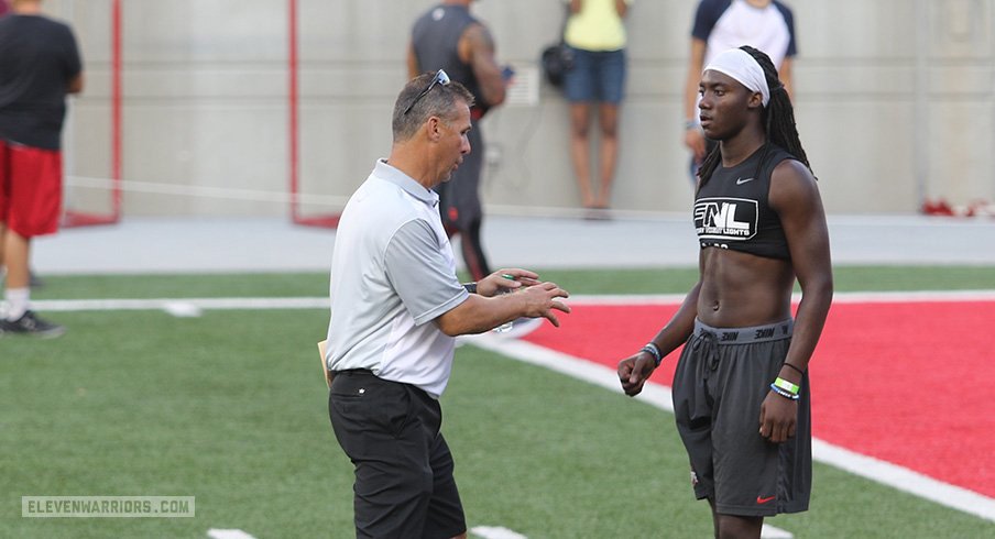 Urban Meyer chats with 2018 quarterback prospect Emory Jones.