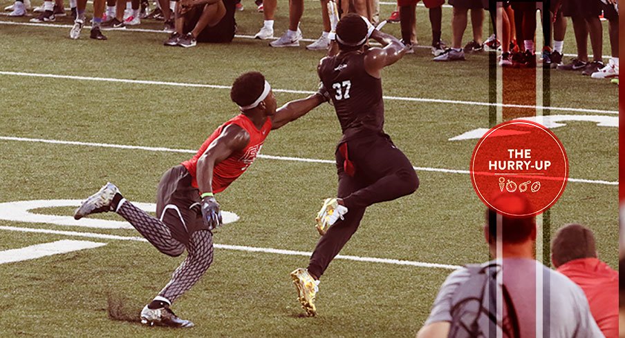 Tyjon Lindsey, right, attempts to haul in a pass at Friday Night Lights.