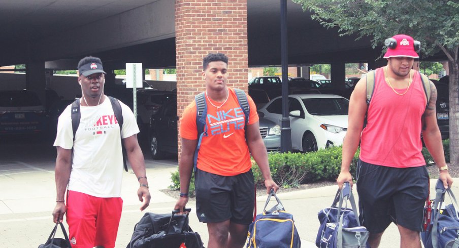 Jerome Baker, Dre'Mont Jones and Branden Bowen check into fall camp last year. 