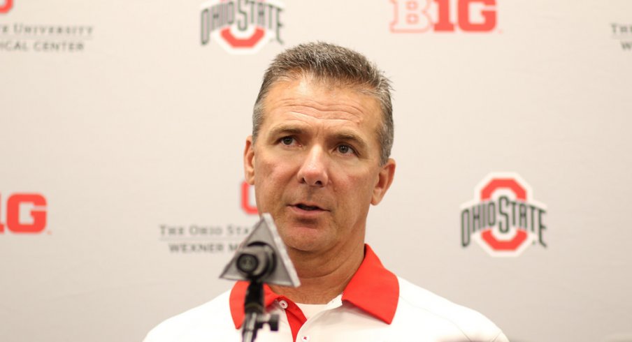 Urban Meyer addresses the media.