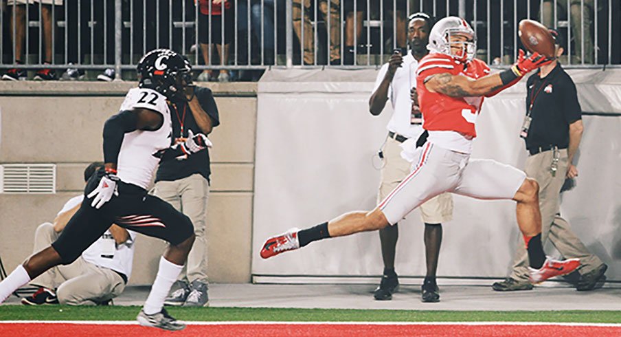 Devin Smith hauls in a touchdown pass against Cincinnati in 2014.