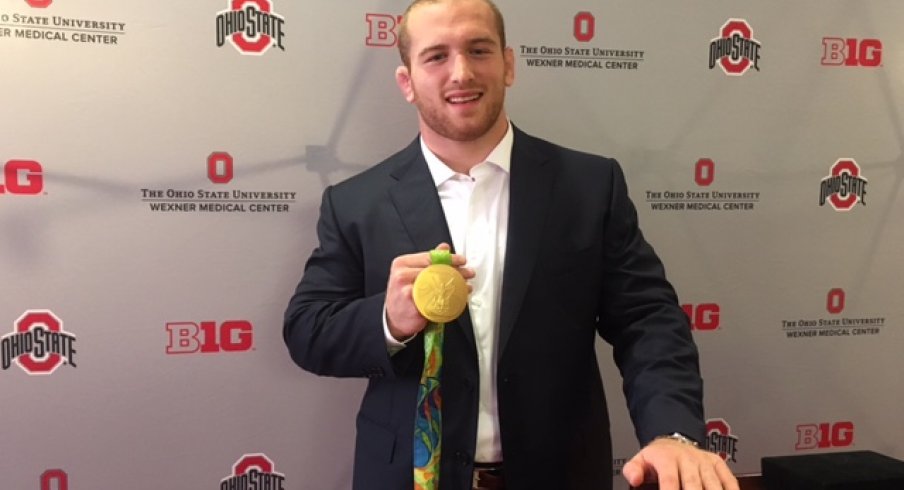 Kyle Snyder shows off his Olympic Hardware.