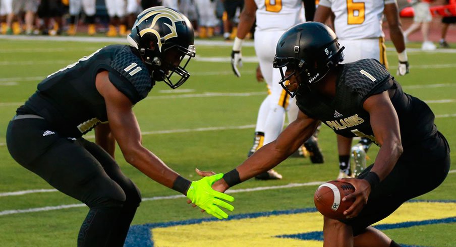 Paramus Catholic celebrates a touchdown against St. Francis Academy at Michigan Stadium. - USA TODAY