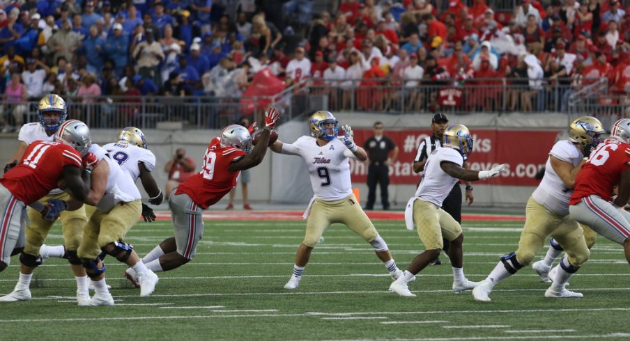 Ohio State's Tyquan Lewis forces a fumble against Tulsa. 