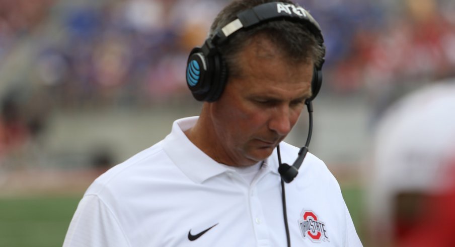 Urban Meyer strolls the sidelines against Tulsa. 