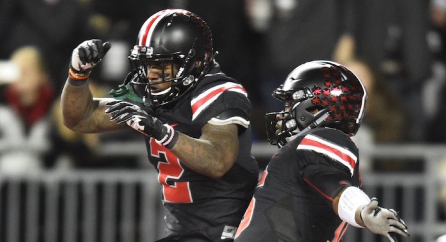 J.T. Barrett, Dontre Wilson celebrate a touchdown last season vs. Penn State.