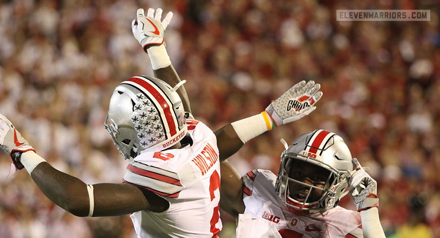 Ohio State's Dontre Wilson, Curtis Samuel celebrate a touchdown. 