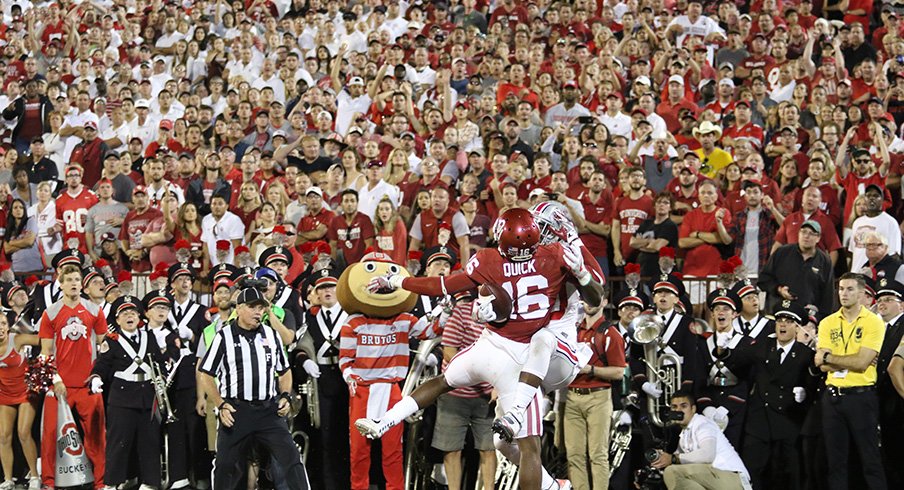 Noah Brown snags an insane catch against Oklahoma. 