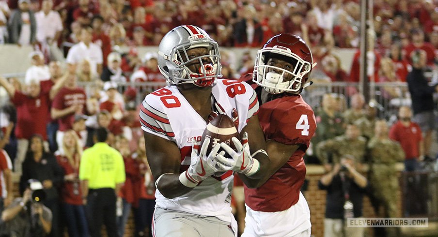 Noah Brown hauls in one of his four touchdown receptions against Oklahoma.