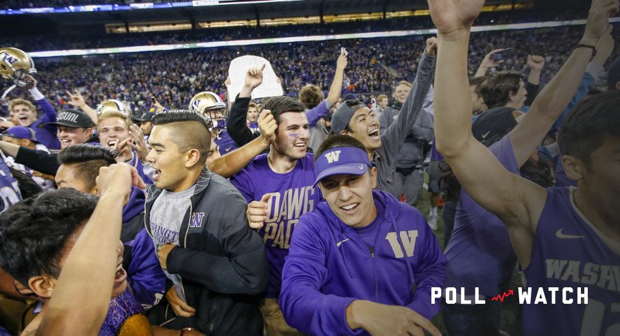 Sep 30, 2016; Seattle, WA, USA; Washington Huskies students rush the field after a game against the Stanford Cardinal at Husky Stadium. Washington won 44-6. Mandatory Credit: Jennifer Buchanan-USA TODAY Sports