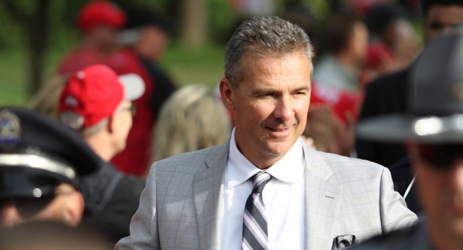 Urban Meyer on a pregame strut.