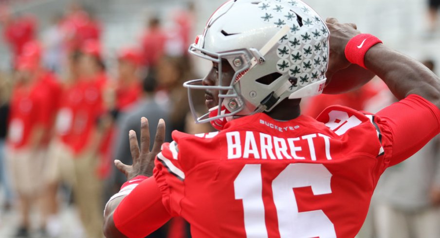 Ohio State quarterback J.T. Barrett warms up Saturday vs. Rutgers.