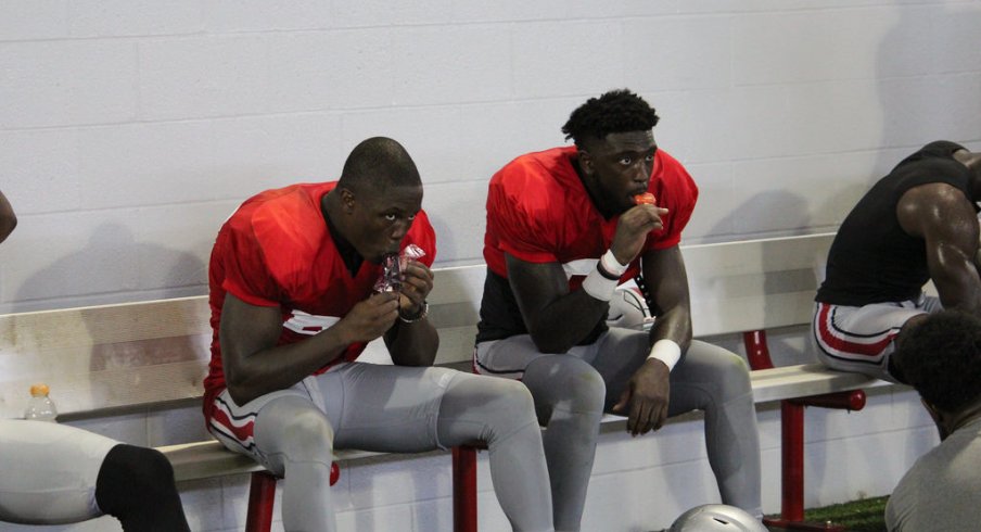 Terry McLaurin and Parris Campbell cool down after practice. 