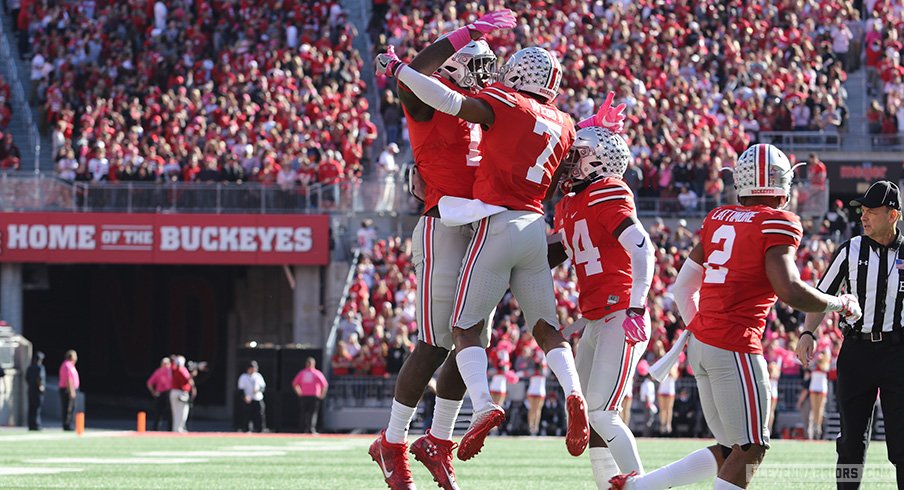 Ohio State's defense celebrates a first-half turnover.