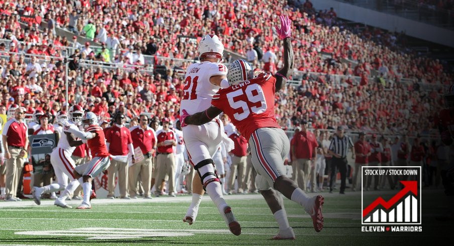 Ohio State's Tyquan Lewis forces a fumble. 