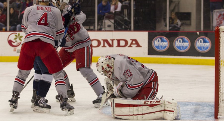 Matt Tomkins tends net during Ohio State hockey's contest against Air Force.