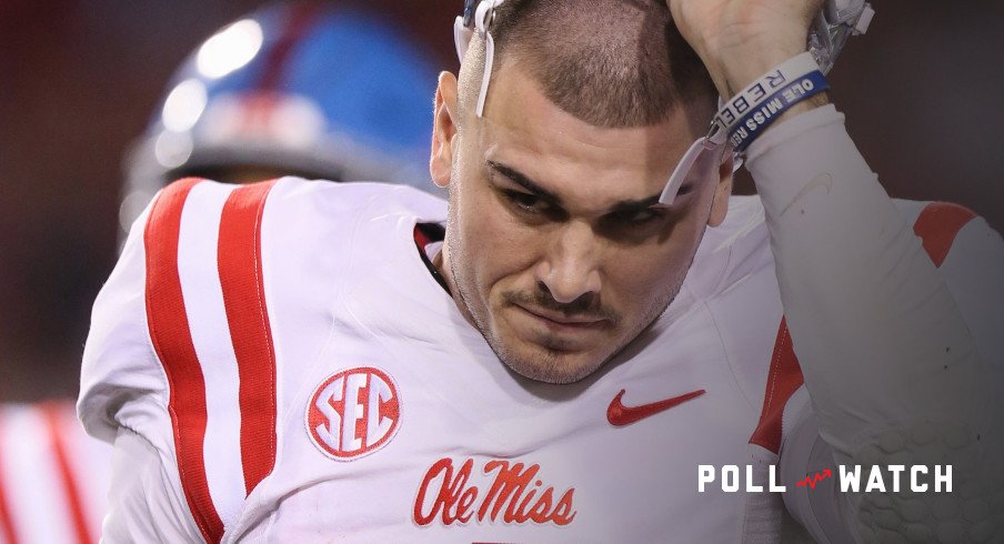 Oct 15, 2016; Fayetteville, AR, USA; Ole Miss Rebels quarterback Chad Kelly (10) returns to the sideline during a timeout in the second hola of the game against the Arkansas Razorbacks at Donald W. Reynolds Razorback Stadium. Arkansas defeated Ole Miss 34-30. Mandatory Credit: Nelson Chenault-USA TODAY Sports