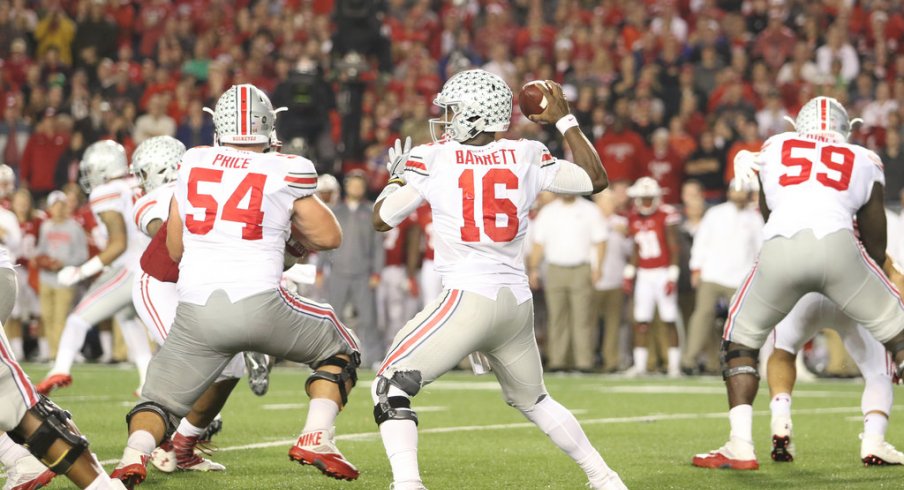 J.T. Barrett drops back to pass vs. Wisconsin. 