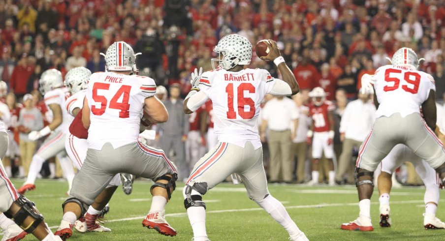 J.T. Barrett drops back to pass vs. Wisconsin. 