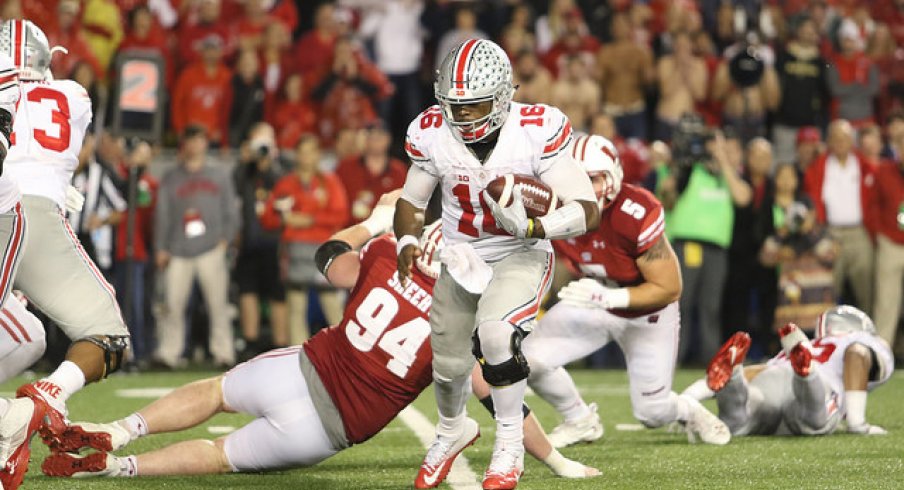 J.T. Barrett runs the ball against Wisconsin.