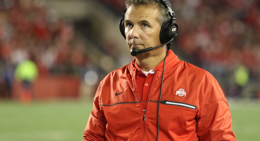 Ohio State coach Urban Meyer strolls the sidelines at Wisconsin. 