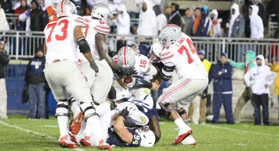 J.T. Barrett was sacked six times in Ohio State's 24-21 loss to Penn State in Happy Valley. 