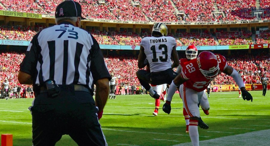 Michael Thomas makes a circus catch against the Saints.