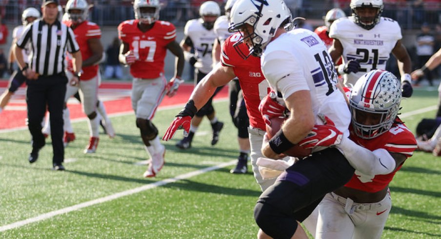 Malik Hooker makes a tackle against Northwestern.