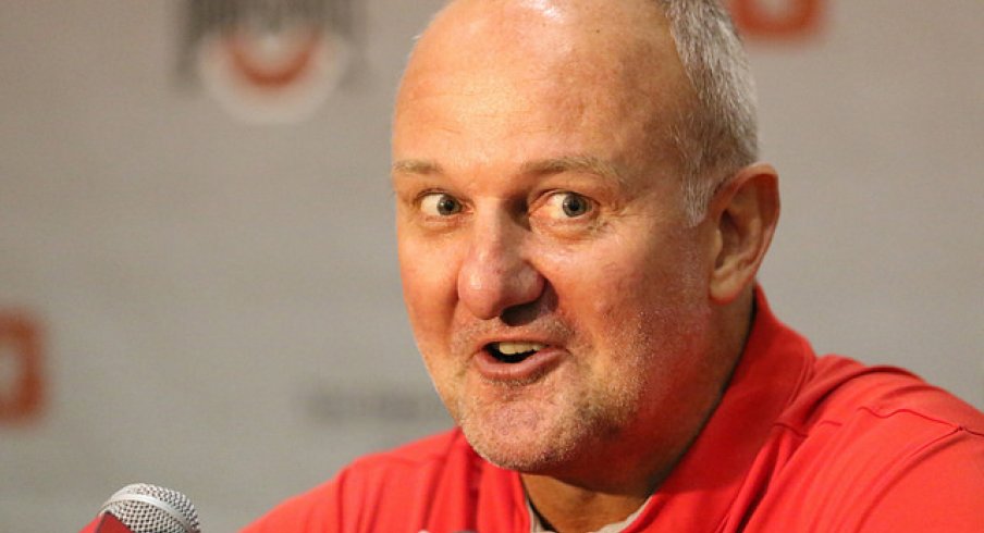 Thad Matta talks with reporters.