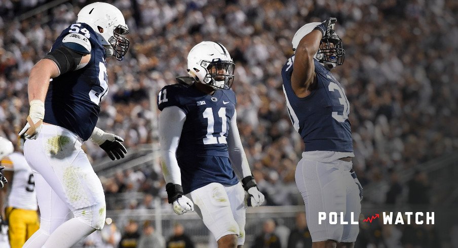 Nov 5, 2016; University Park, PA, USA; Penn State Nittany Lions defensive tackle Kevin Givens (30) reacts with teammates linebacker Brandon Bell (11) and defensive tackle Robert Windsor (54) following his sack of Iowa Hawkeyes quarterback C.J. Beathard (not pictured) during the third quarter at Beaver Stadium. Penn State defeated Iowa 41-14. Mandatory Credit: Rich Barnes-USA TODAY Sports
