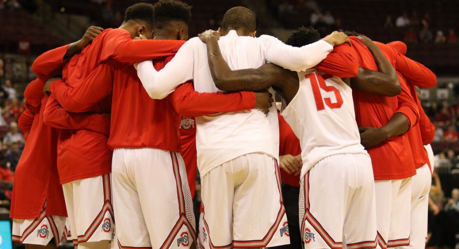 Ohio State huddles before its exhibition against Walsh. 