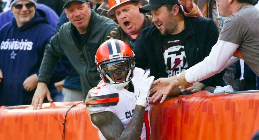 Terrelle Pryor celebrates a touchdown with Cleveland Browns fans.