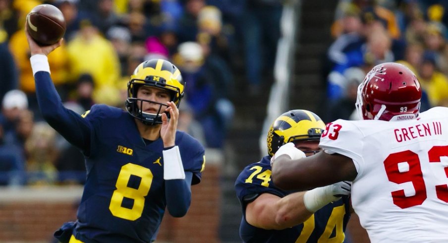 John O'Korn throws a pass against Indiana.