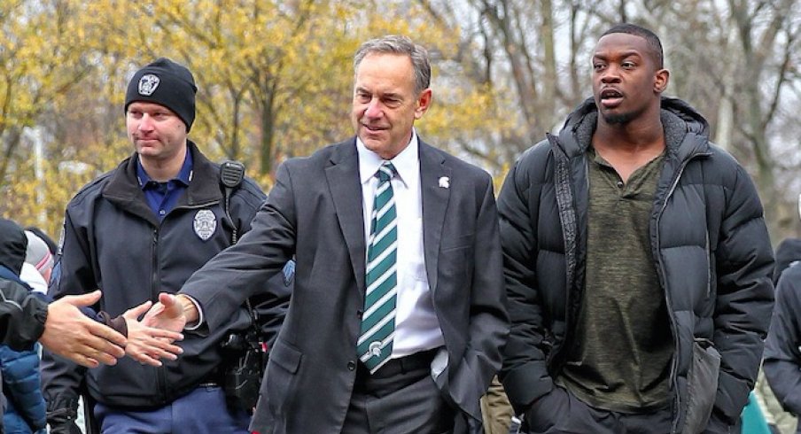 Mark Dantonio walks into Spartan Stadium ahead of clash with Ohio State.