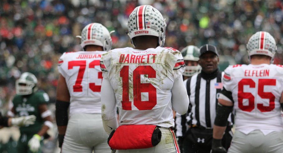 J.T. Barrett gets ready for a snap vs. Michigan State. 