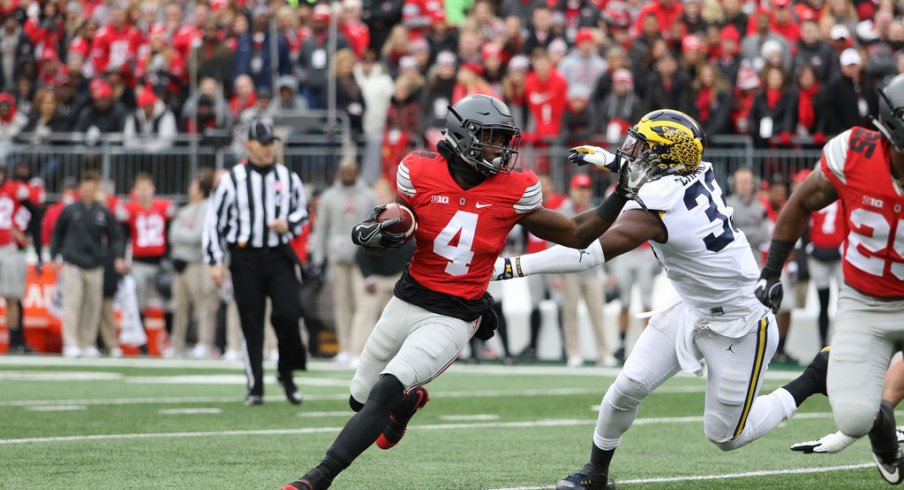 Curtis Samuel runs against Michigan. 