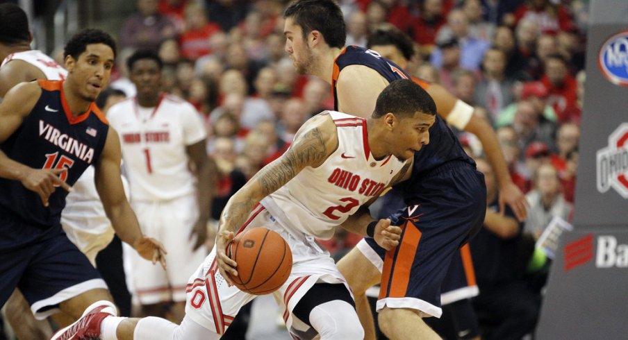 Marc Loving dribbles against Virginia last season. 